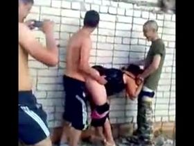 Ебля солдатской девушки и роты солдат возле разрушенного здания